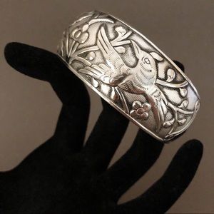 Silver cuff bracelet.